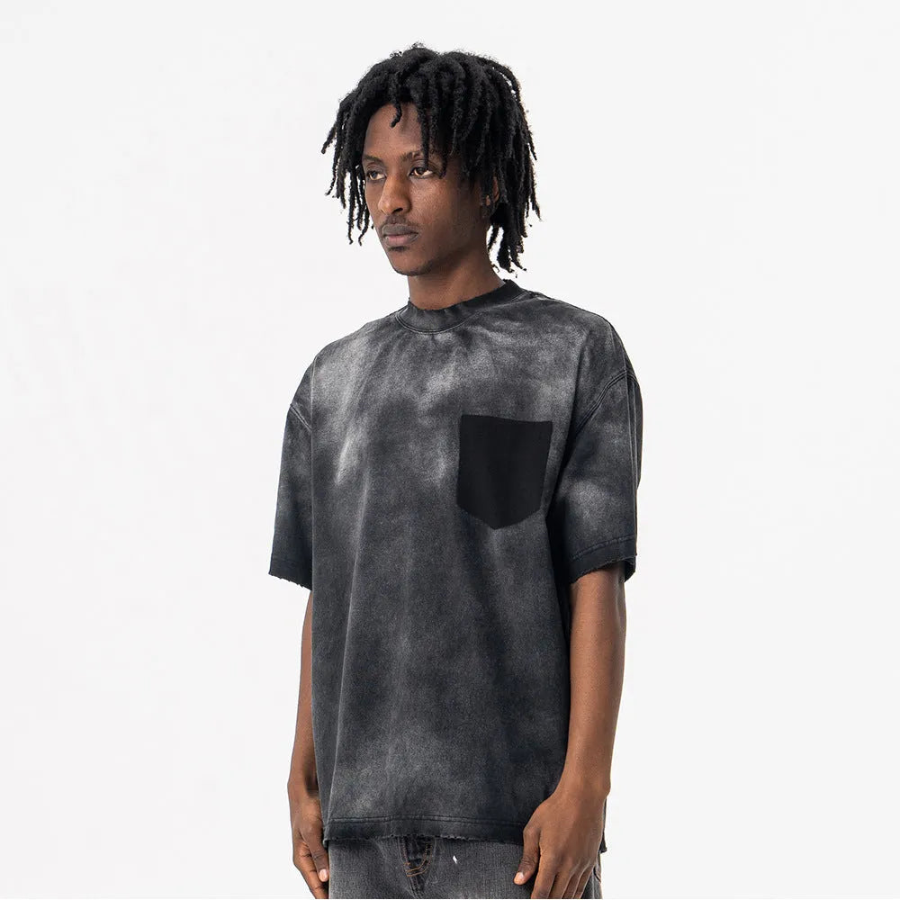Black men's loose fit cotton t-shirt with drop-shoulder sleeves and a printed letter design on the front.