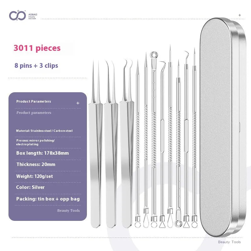 Four metal acne needles with ultra-fine pointed tips laid out in a set.