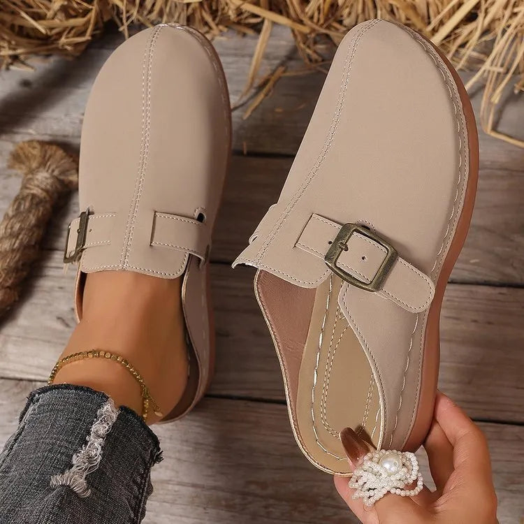 Women's lightweight outdoor wedge slipper in a choice of colours, showing closed toe and rubber sole.