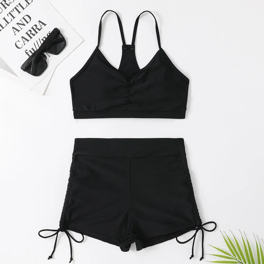Purple women's high waisted bikini swimsuit with split side shorts and matching top