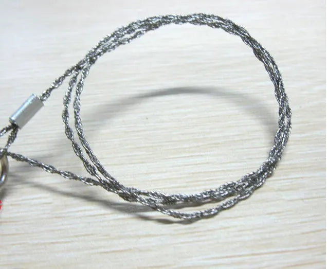 Outdoor survival wire saw with stainless steel blade, pull rings, and hoop showing 55cm cutting length