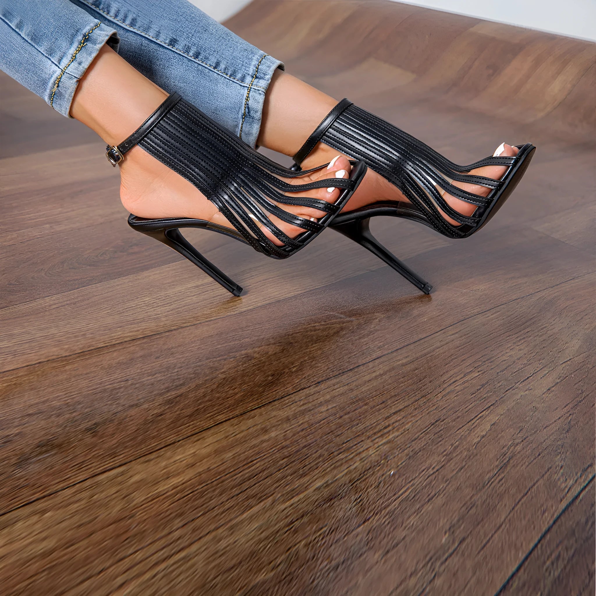 Ladies black PU stiletto heel open toe sandals with buckle fastening, Roman pointed toe style