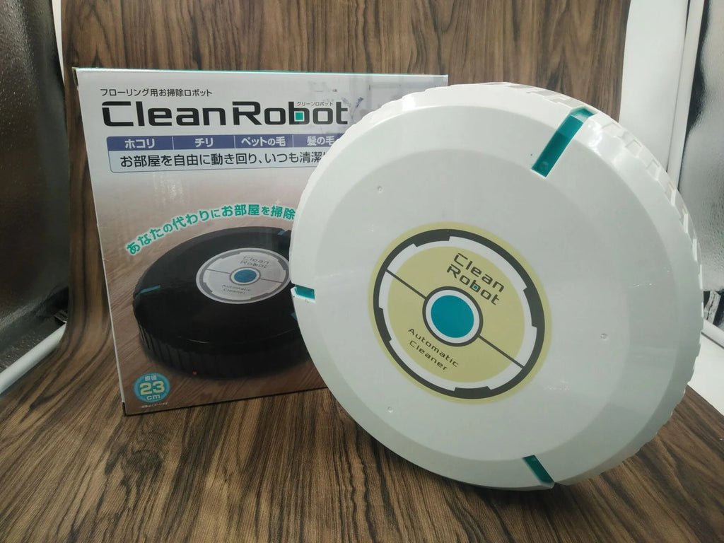Black and white AC Sweeping Robot automatic vacuum cleaner on a hardwood floor.