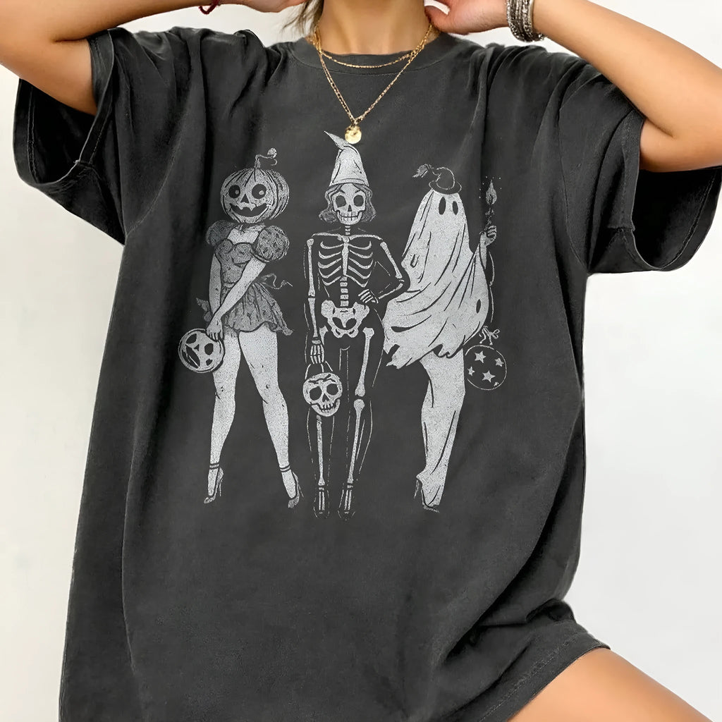 Loose straight-cut cotton T-shirt in grey with short sleeves and round neck.