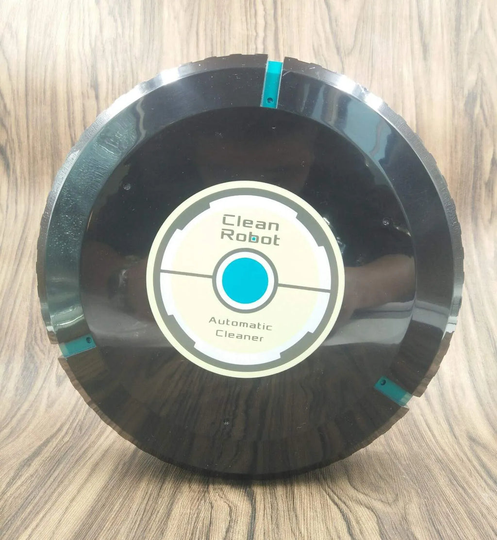 Black and white AC Sweeping Robot automatic vacuum cleaner on a hardwood floor.