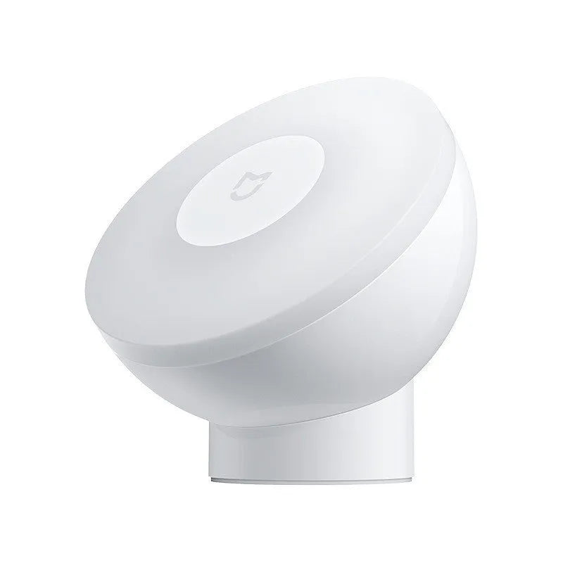 White Mijia Night Light 2 Bluetooth bedside lamp with human body induction on a table.