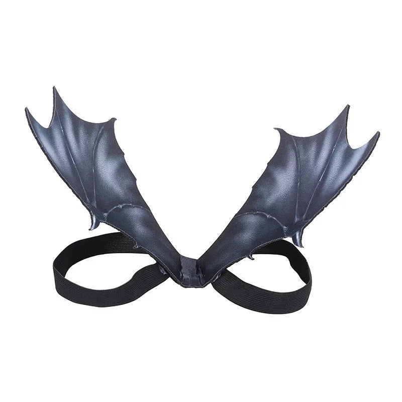 Black cloth bat wings pet costume shown on dog with three size options displayed