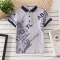 Boys short sleeve cotton shirt in grey, navy, red, or white with lapel collar.