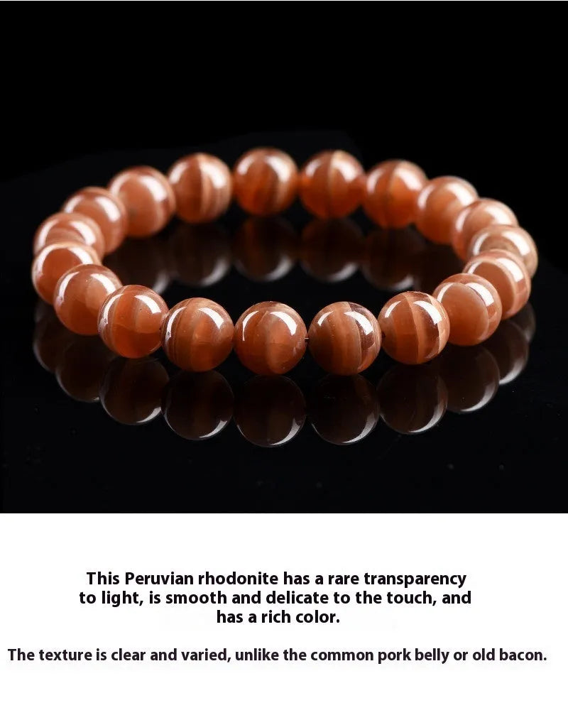 Natural Old Mine Rhodochrosite round beads bracelet from Peru showing manganese spar mineral colour