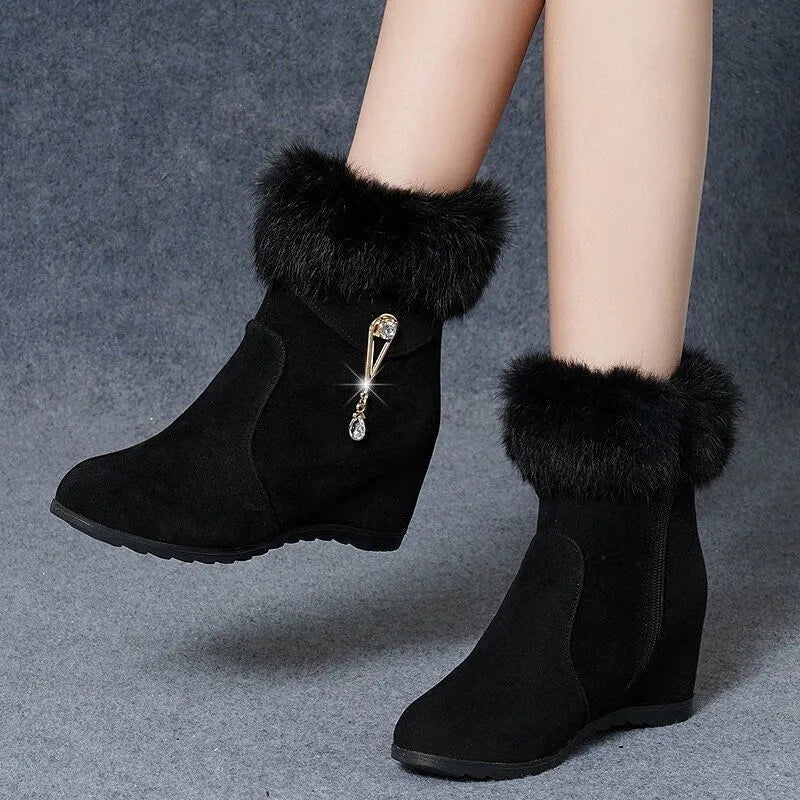 Black height increasing insole snow boots for women with fur integration upper and casual design