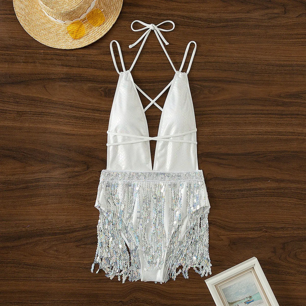 White women's one-piece swimsuit with deep V neckline and tassel decoration