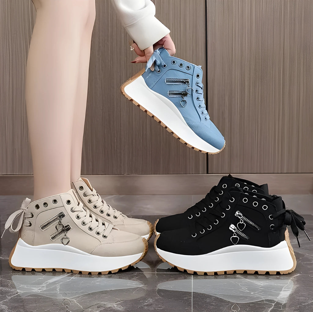 Women's high-top platform shoes in black artificial PU with round toe and lace-up design.
