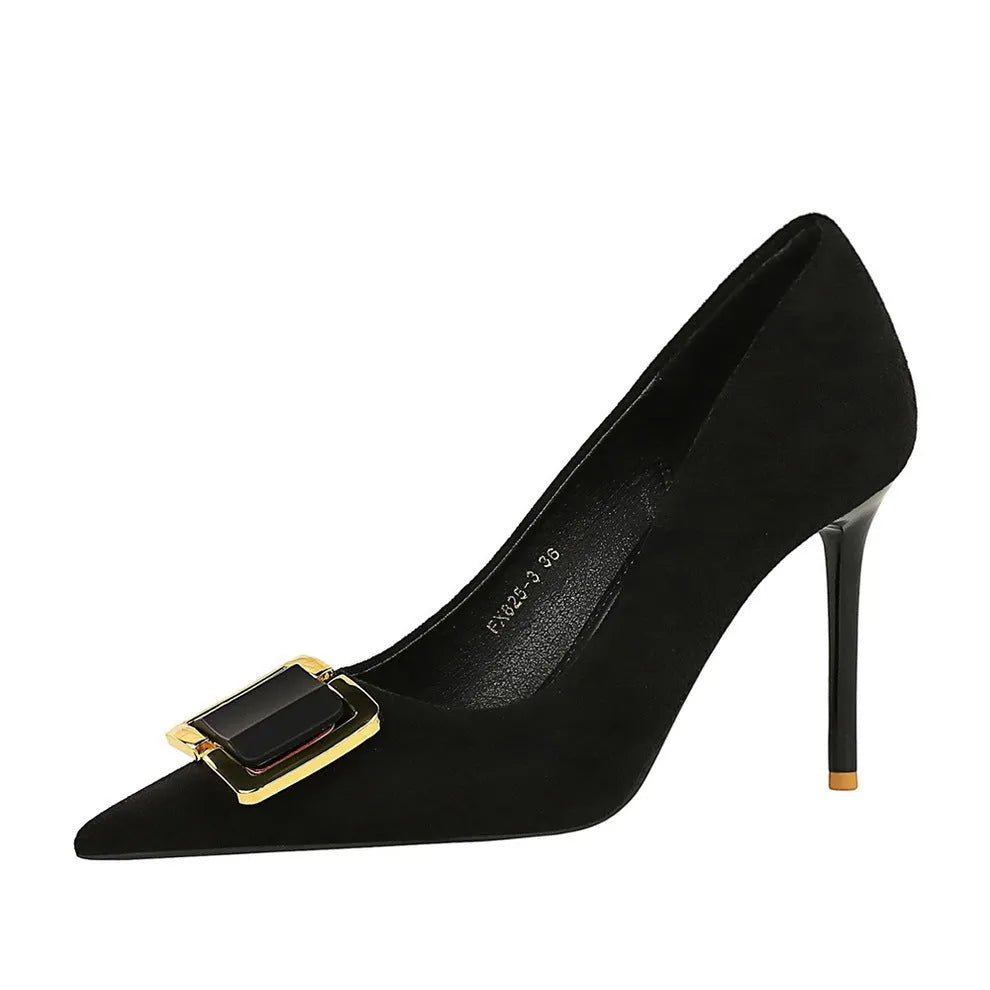 Black suede women's stiletto high heels with a pointed toe and 9cm heel on a white background.
