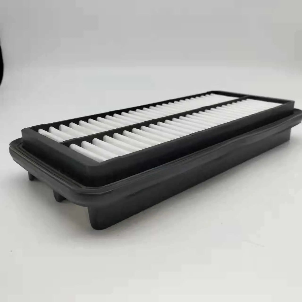 Black car air filter for Modern vehicles with dimensions 256*113*40 mm