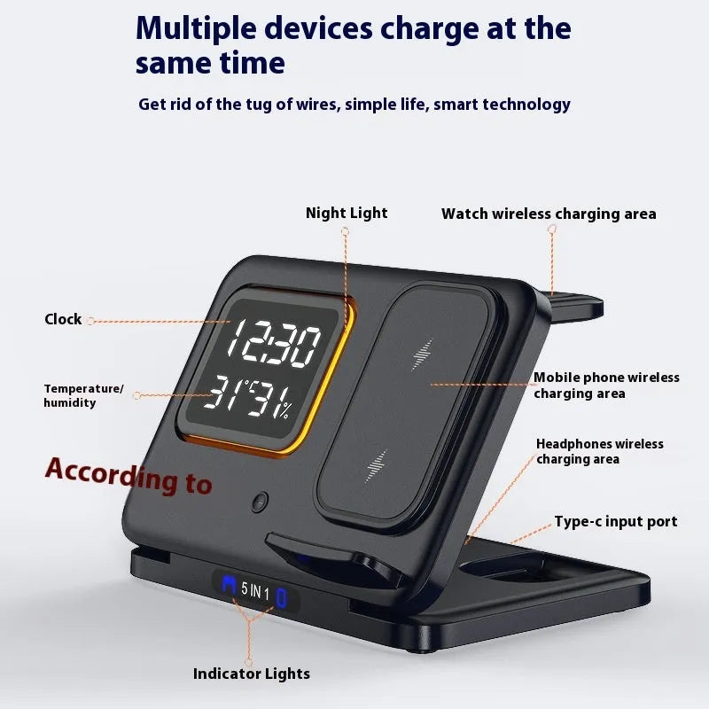 Black and white 5-in-1 wireless charging dock station with phone, watch and earphones charging, showing LED clock display.