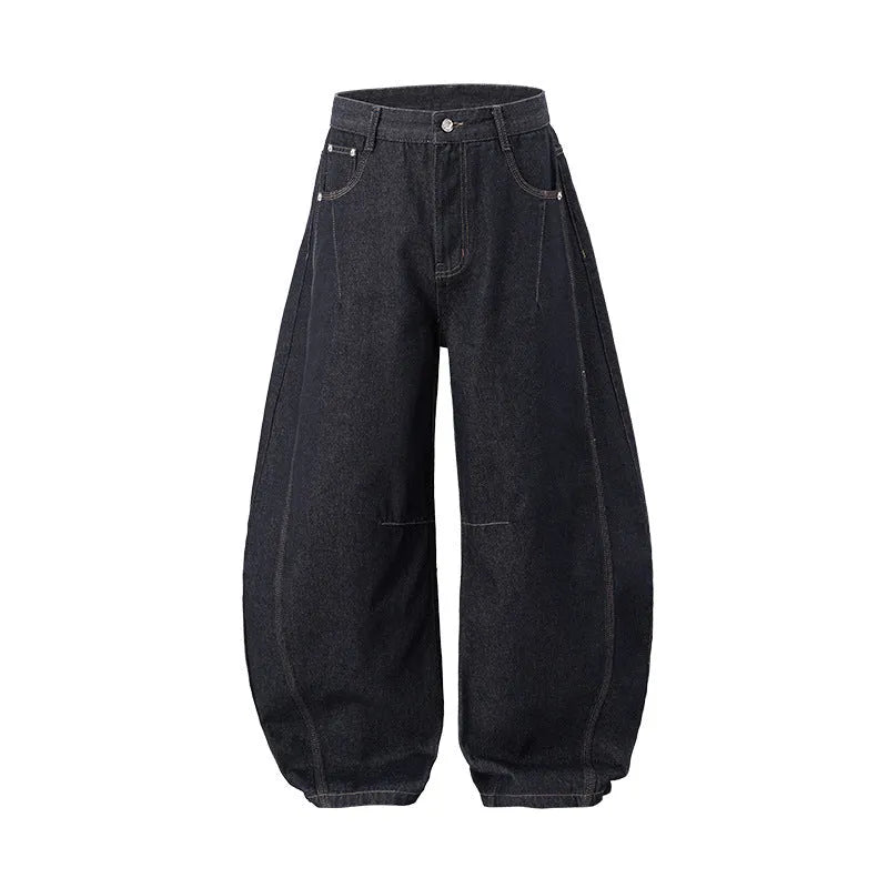 Men's wide leg denim trousers in original cow colour showing relaxed fit and mid waist construction