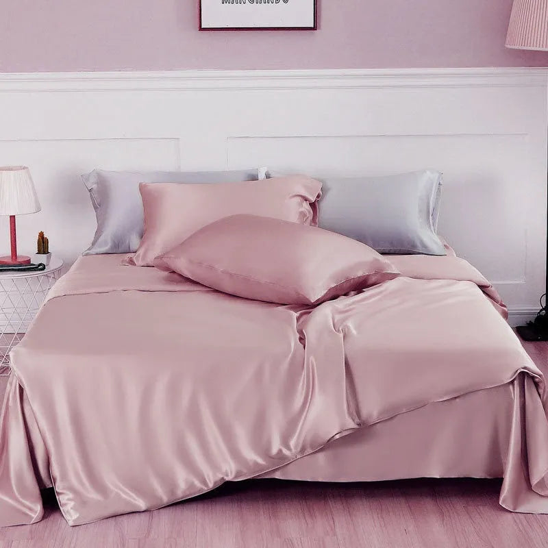 Solid colour silk duvet cover laid flat, showing double-sided construction and smooth texture.