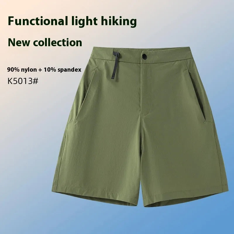 Men's khaki quick-drying sports shorts with elastic waist and 3D cut design for running and outdoor activities.