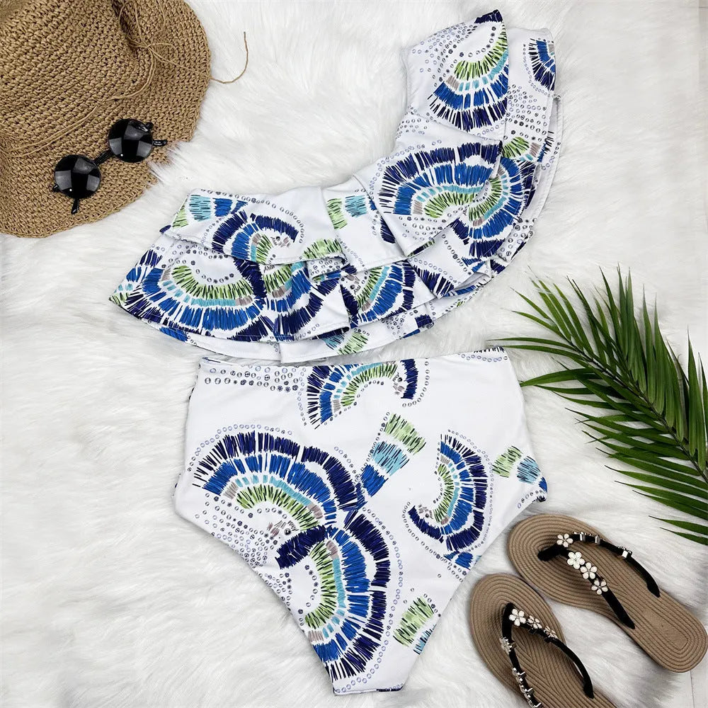 White women's one-shoulder swimsuit with double-layer lotus leaf design and high side leg split