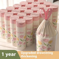 Pink degradable argy wormwood mosquito repellent garbage bag with drawstring, size 44cm by 48cm.