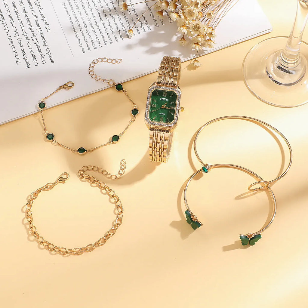 Gold green square dial women's watch with four matching alloy bracelets displayed together