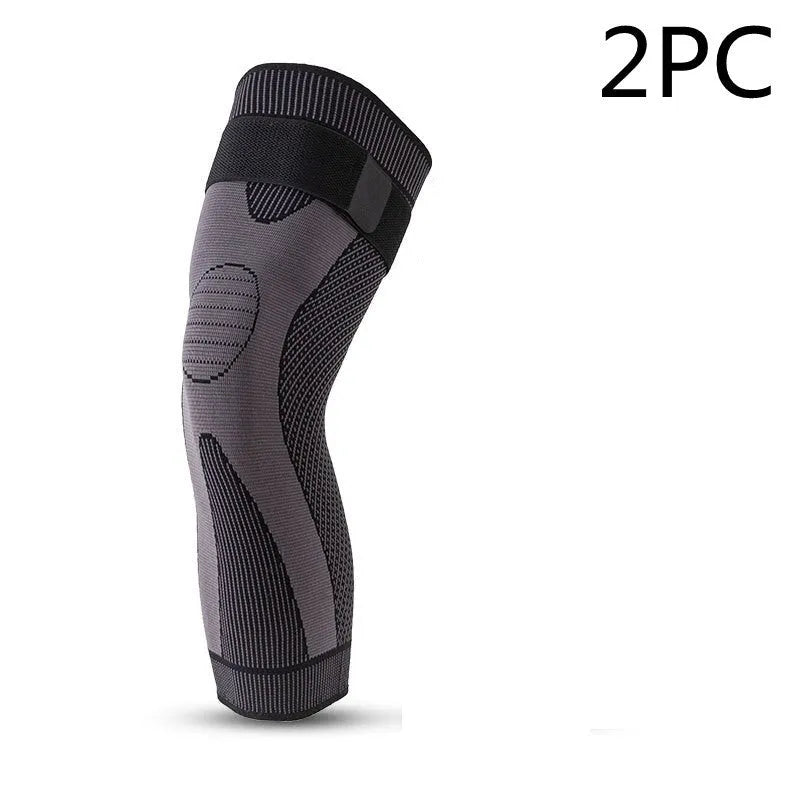 Green long straps knee pads with non-slip leggings for sports protection on a white background