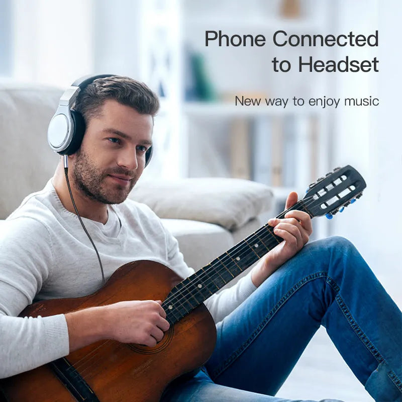Silver and black nylon braided audio cable with 3.5mm connectors for car aux and headphone use