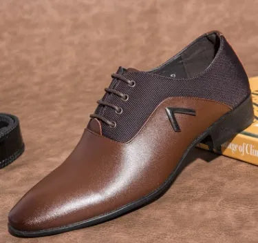 Men's black Oxford shoes with a low upper, brogue detailing, and a rubber sole.