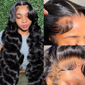 Black medium-long curly synthetic wig on a full-head mesh base.
