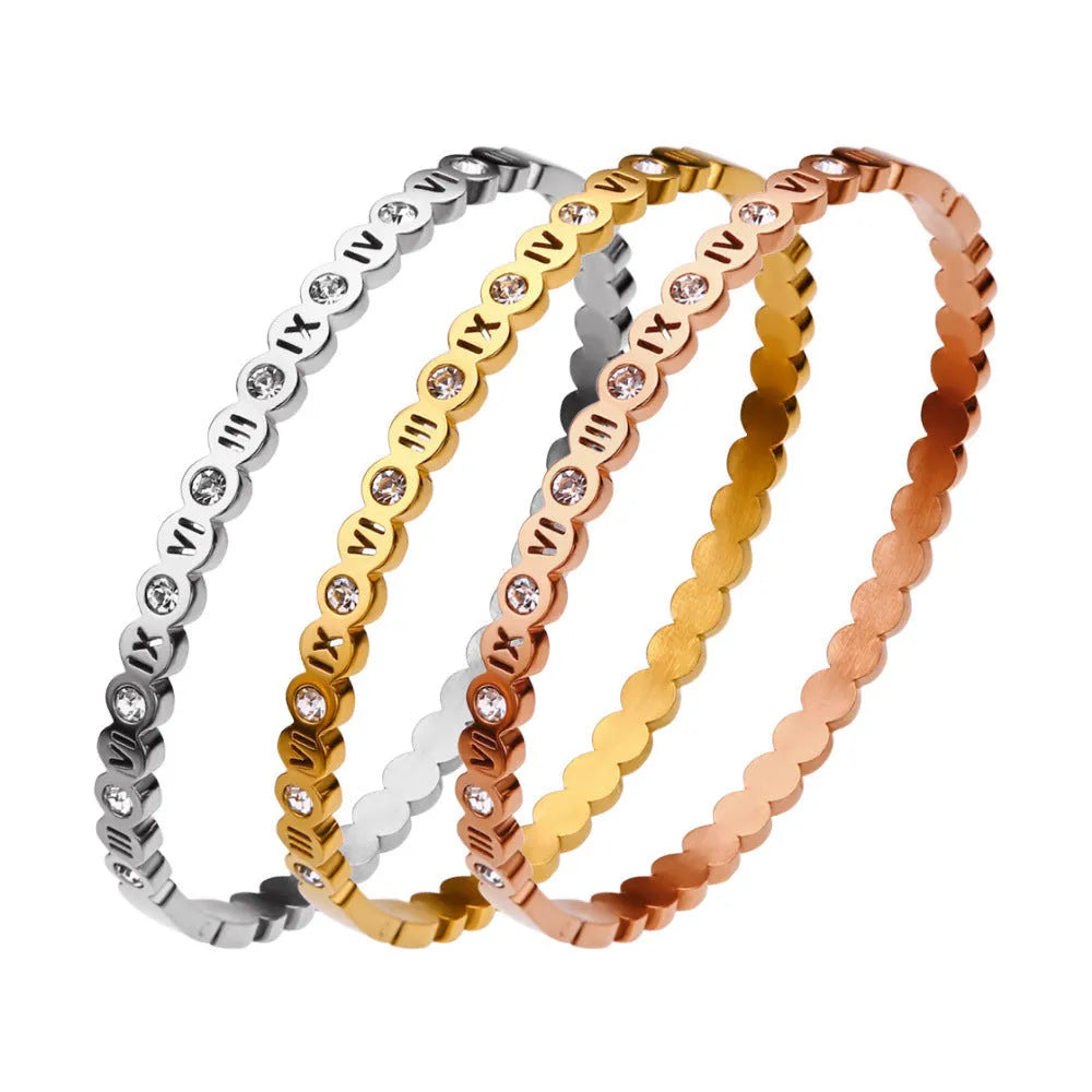 Korean style titanium steel bracelet in gold, rose gold or steel colour with number design details.