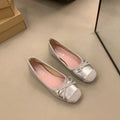Women's retro apricot Mary Jane ballet flats with square toe and bow decoration on a rubber sole.