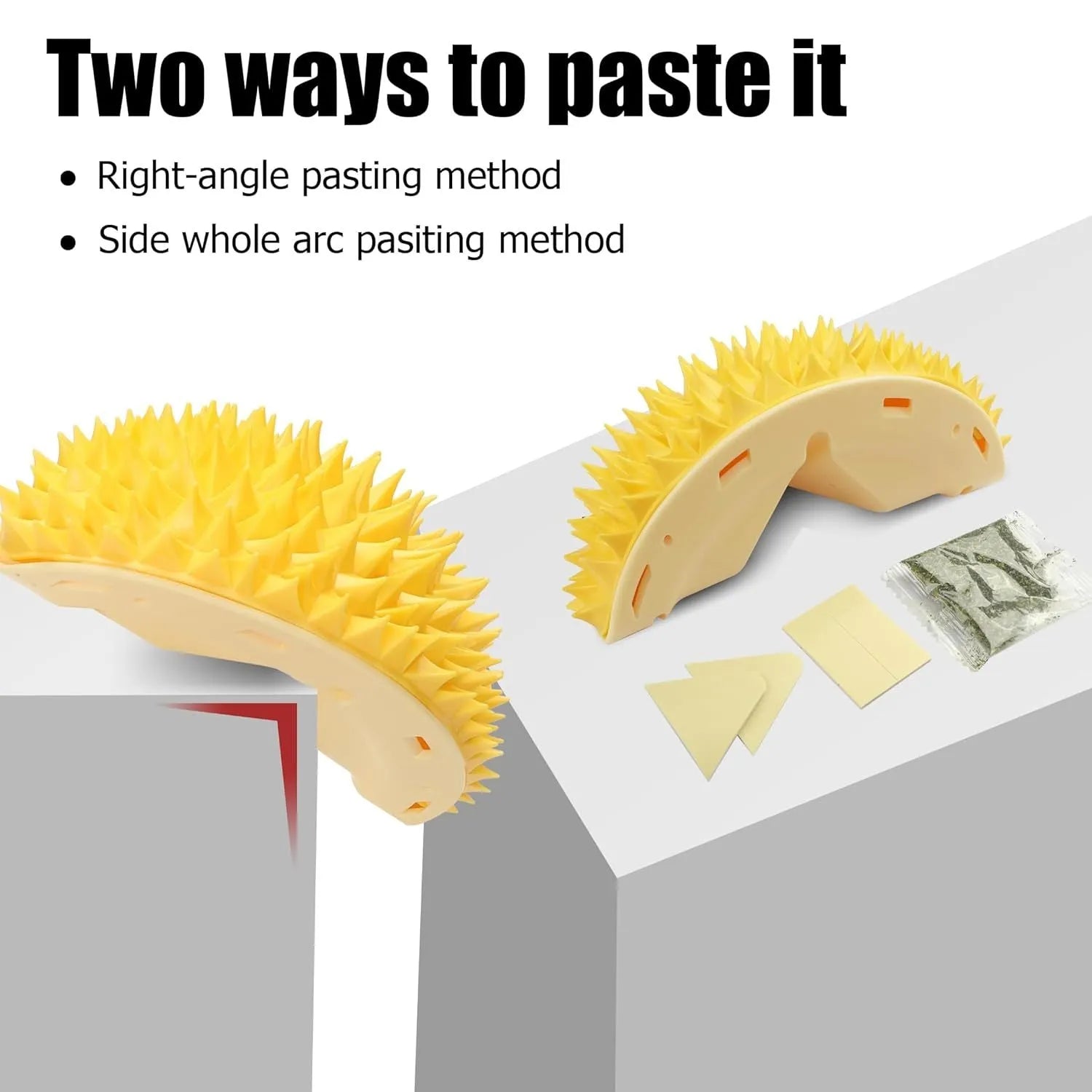 Yellow durian-shaped cat corner scratcher and massage comb with cat mint powder on a wall corner.