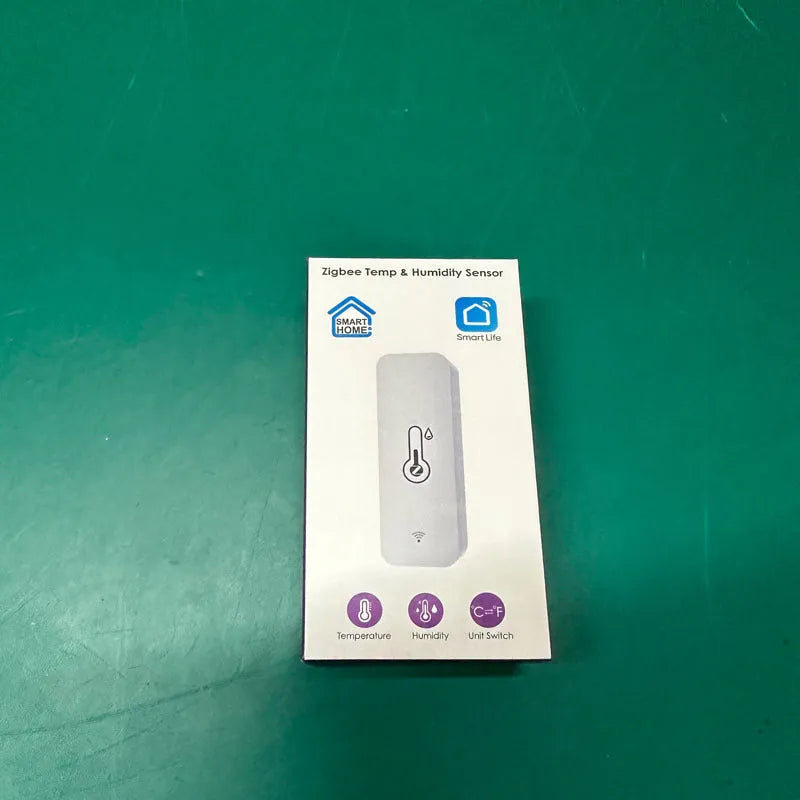 White WiFi temperature and humidity sensor with LCD display showing readings, compact rectangular ABS housing
