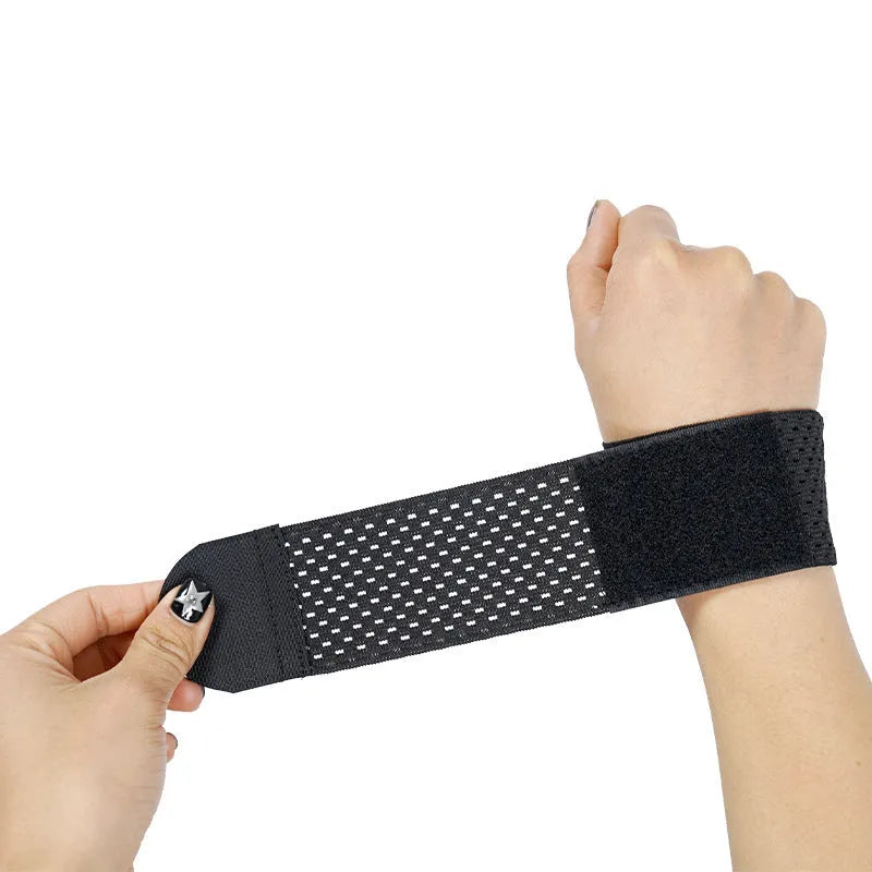A black elastic breathable wrist guard for athletic wrist support.