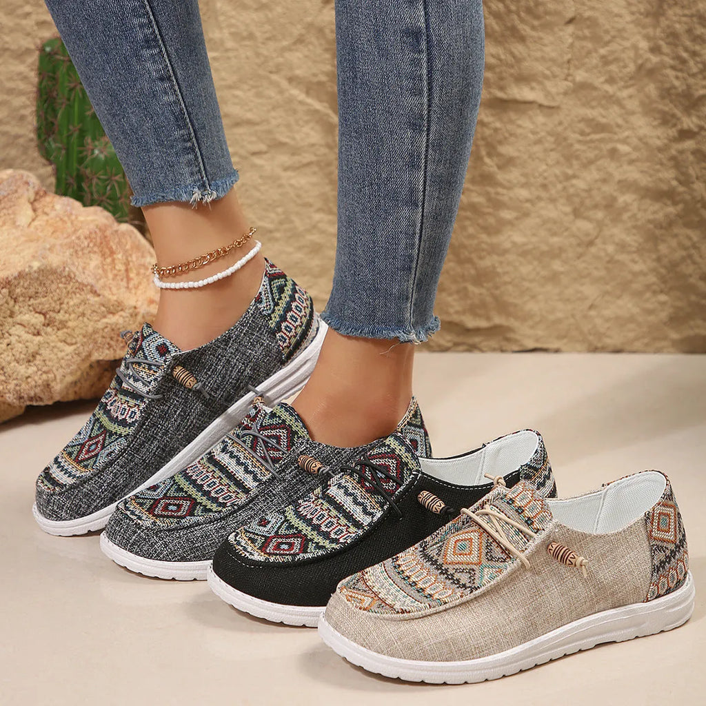 Women's low-top slip-on flat shoes with a round toe in artificial PU, shown in khaki colour on a white background.