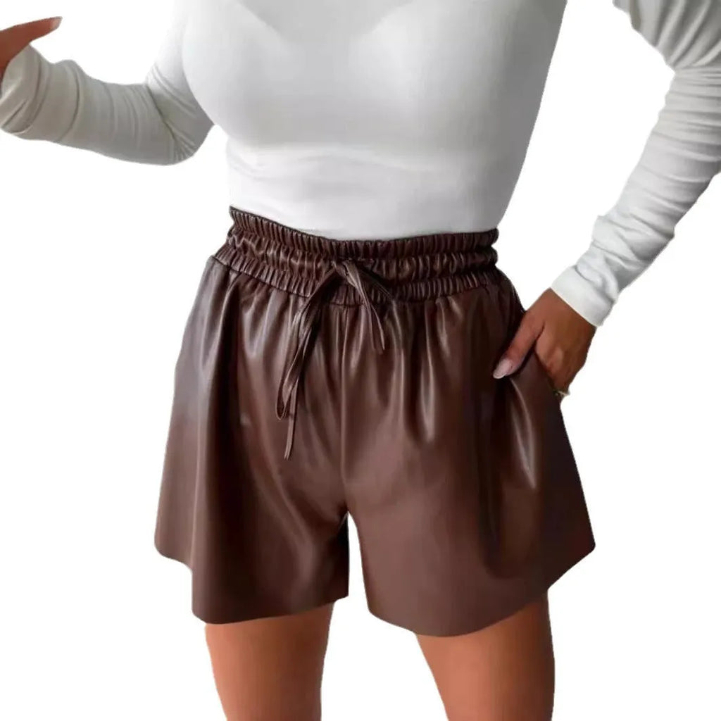 Women's black drawstring lace shorts with wide-leg casual styling and PU leather waist detail