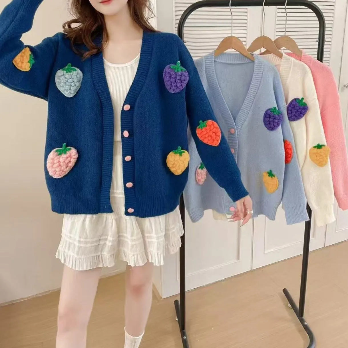 Handmade embroidery thick knit cardigan in light blue with loose fit and long sleeves