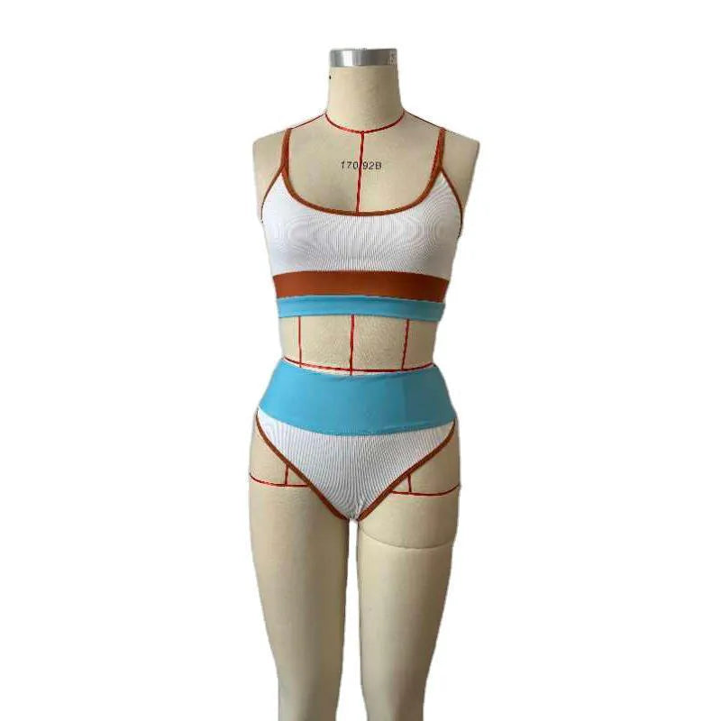 Women's solid colour quick-drying swimwear set with top and shorts in nylon fabric