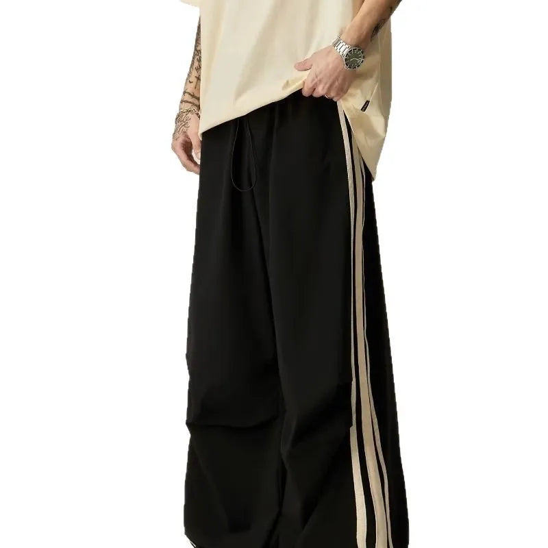 Men's black wide leg climbing trousers with high waist and straight cut in polyester fibre material