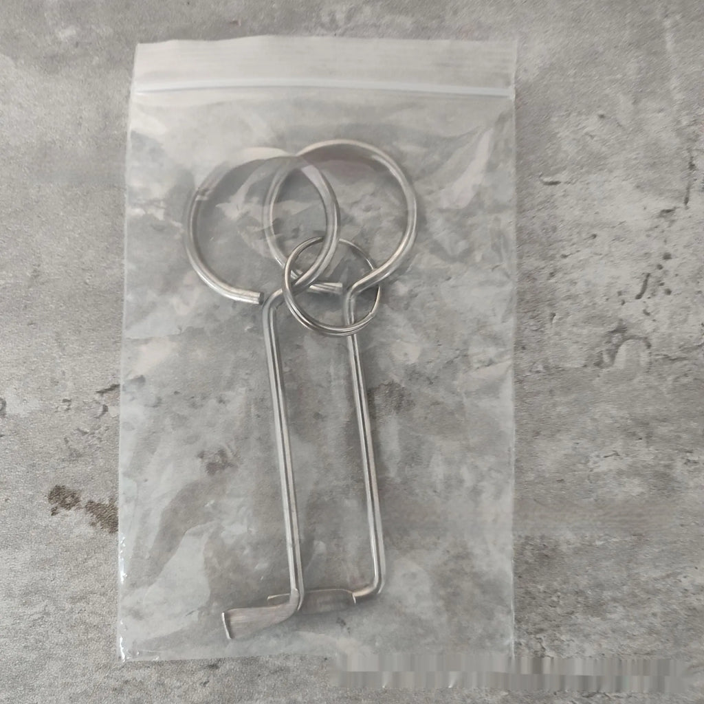 Two alloy metal wrench tools from a portable universal set for DIY and repairs.