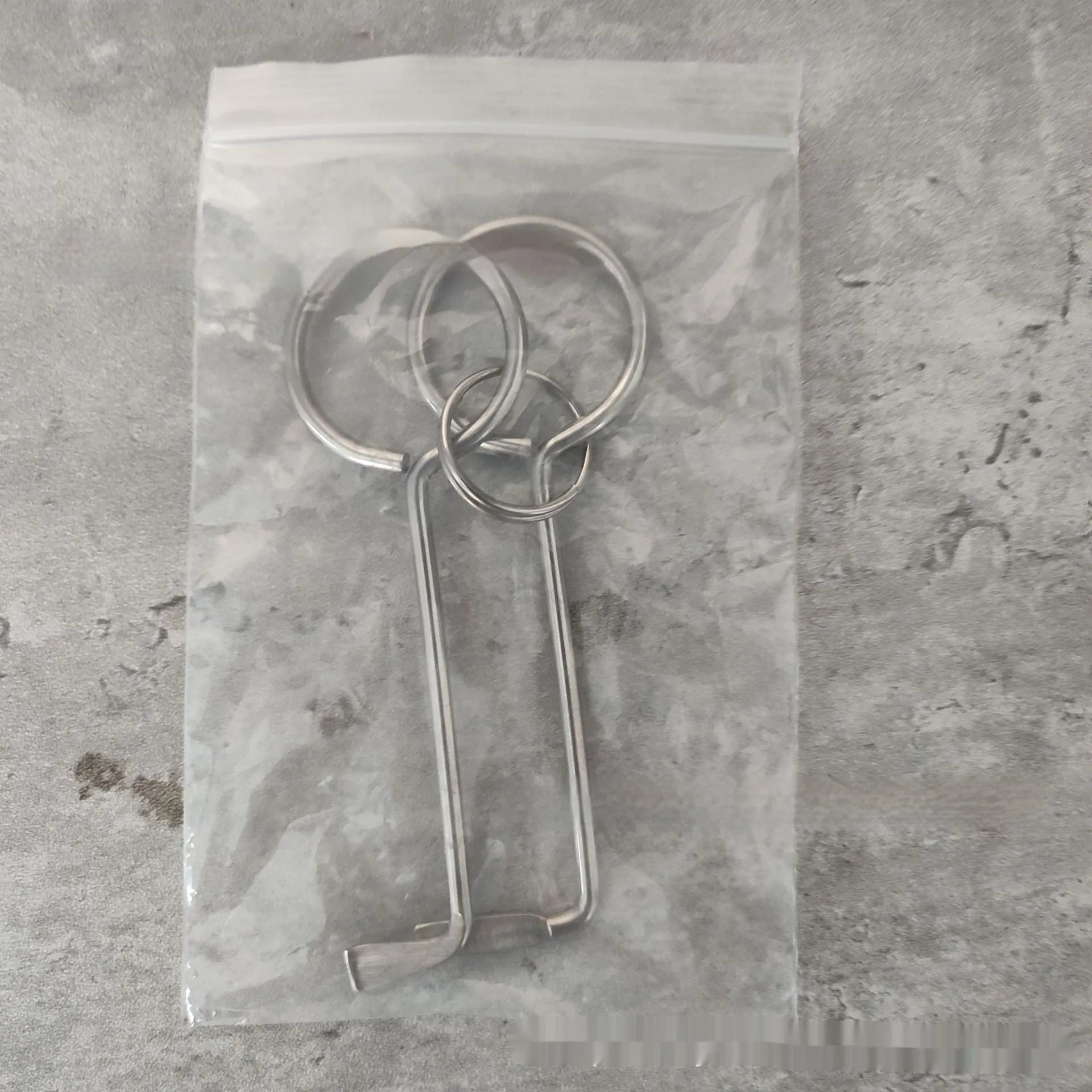 Two alloy metal wrench tools from a portable universal set for DIY and repairs.