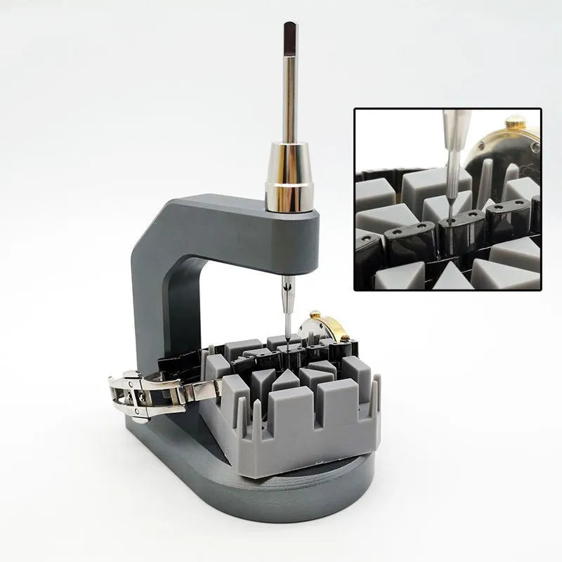 Silver tool steel multi-purpose press strap removal tool with 0.50-1.60mm blade on a workshop surface.