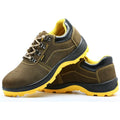 Bronze-coloured leather safety shoes with a steel toe cap and textured anti-slip sole.