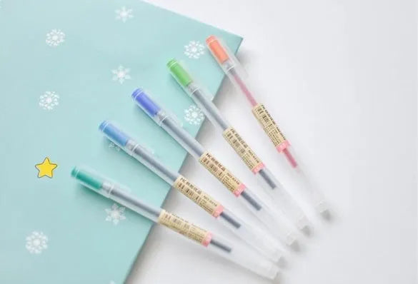 Muji 0.5mm gel pen 12-piece set showing fine nib and ink prevention mechanism