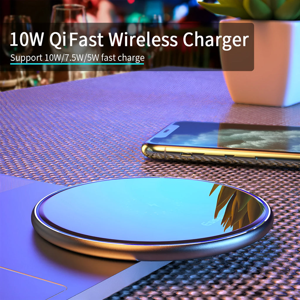 Black aluminium wireless charging pad with LED indicator light on smooth surface