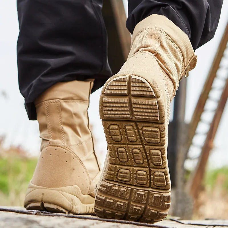 Black and sand coloured Yulong tactical combat boots for outdoor hiking and sports.