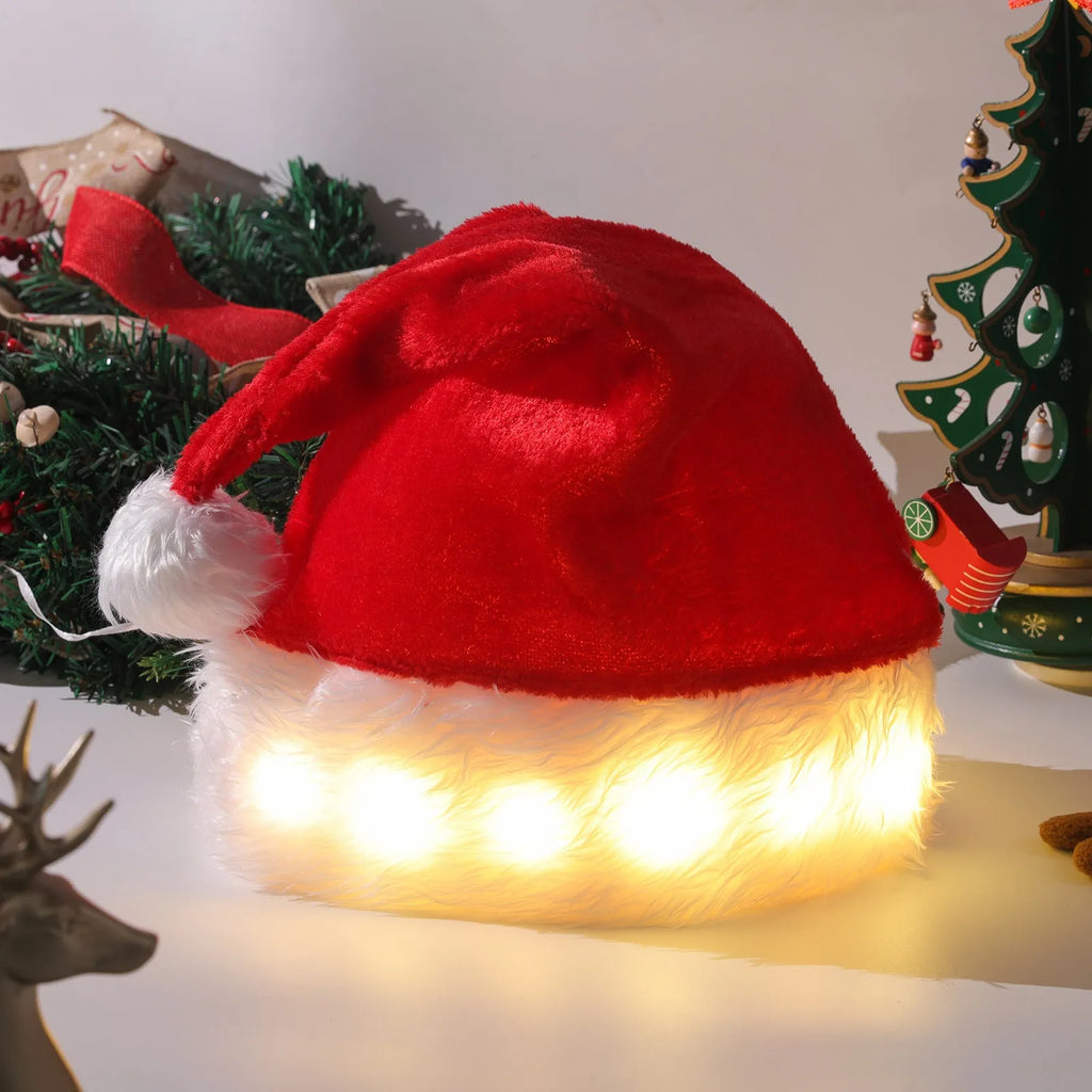 Red and white plush Santa hat with pom-pom and twinkling multi-coloured LED lights around the brim.