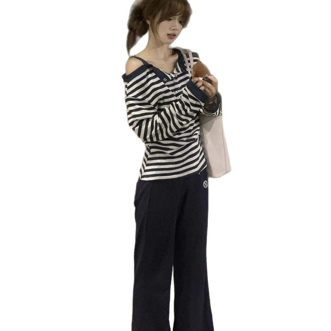 Dark blue oversized long-sleeved women's T-shirt with embroidery and stripe details on soft viscose fabric.