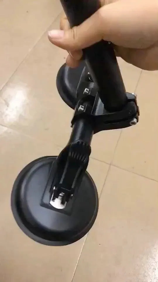 Black off-road car sucker mount with rubber suction cup for attaching flags to vehicle windows.