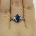 Silver women's ring with geometric hollow pattern and zircon stone on electroplated alloy